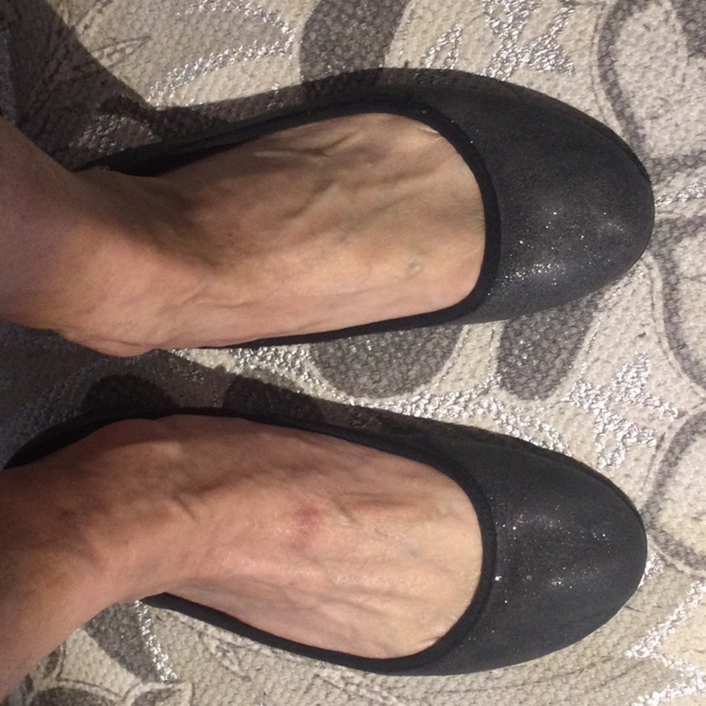 Well worn ballet flat